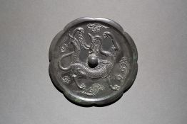 A Bronze Octafoil Dragon Decorated Mirror Tang Dynasty