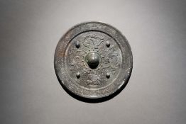 A Bronze Circular Mirror featuring Deities and Beasts Eastern Han Dynasty
