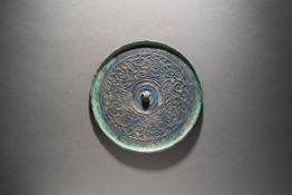 A Bronze Circular Mirror with Coiled Dragons and Clouds Han Dynasty