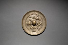 A Bronze Mirror with
