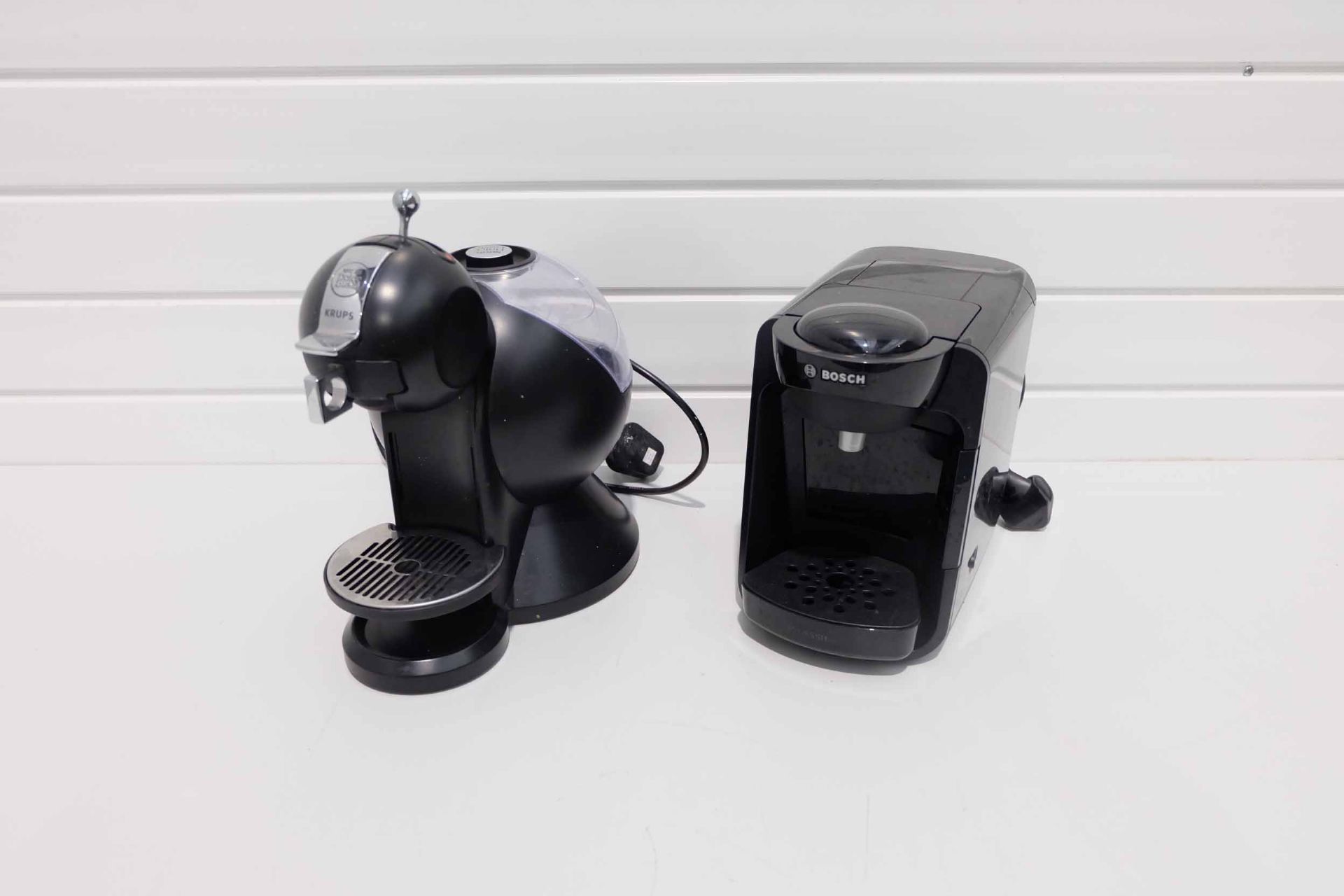 2 x Used Coffee Machines. 1 x Bosch Tassimo. 1 x Dolce Gusto Krups.