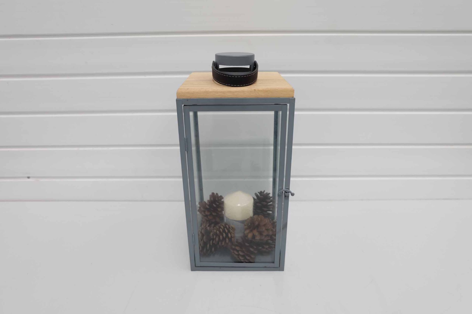 Grey Lantern Candle Holder With Leather Handle and Wooden Top.