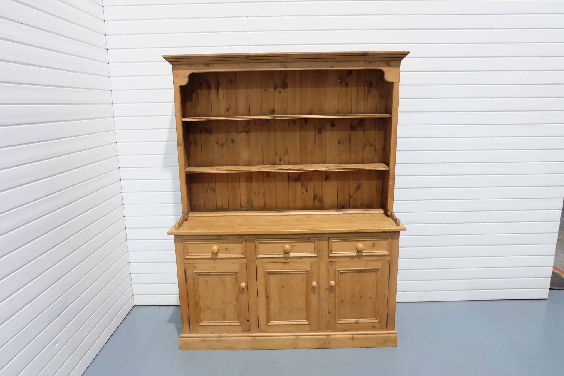 2 Piece Pine Dresser. 2 Shelves in Top Cabinet. 3 Drawers and 3 Doors in Bottom Cabinet.