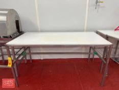S/S Tables: (1) with Poly Top: 66” x 34”, (1) S/S Portable: 4’ x 2’, (1) Portable with Poly Top: 2’
