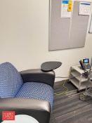 Blue Recliner, Bulletin Board and Cart