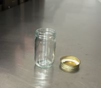 (7,300) 6oz Glass Jars with Lids (count is approximate)