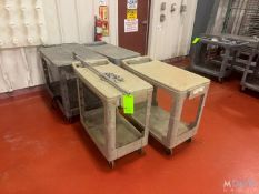 (4) RUBBERMAID PUSH CARTS