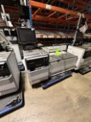 NCR SELF SERVICE CHECKOUT WITH GROCERY BAG DISPENSERS