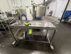 LOT INCLUDING S/S TABLE WITH APPROX. DIMS OF 72 IN. X 30 IN. X 42 IN, EDLUND CAN OPENER AND EDLUND