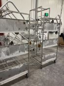 (4) STAINLESS STEEL HOLDING RACKS