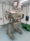 Surekap Capper. Model: SK6000 BF6-58, Serial: CAN23027, with extra large 10cf hopper and cap