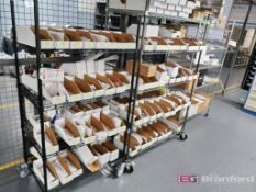 Lot of (3) Castered Wire Metro Racks w/ Contents to Include: Chain Saw Parts, Reciprocal Saw