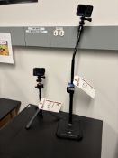 (3) GoPro Cameras, (2) Spare Batteries and (2) Adjustable Camera Stands