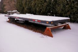 8 ft. x 24 ft. Flat Deck Truck Bed Frame with Stake Sides on (2) Pallets