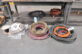 Lot - Extension Cords and Air Hose in (5) Stacks