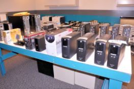 Lot - (7) Battery Backup Units, (2) Routers and (1) 4-Port KVM Switch