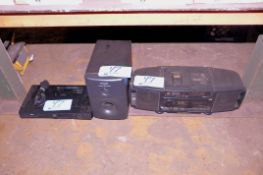 Lot - Handheld Radio, Subwoofer, Blu-Ray Player, Flood Light and Extension Cord Under (1) Table