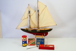 A group of vintage items including a wooden model of a Schooner named Hanah which measures 62 x 52