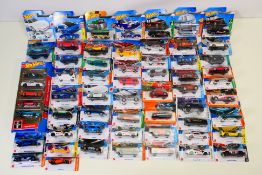 Hot Wheels - Matchbox - 60 x cars, 55 x carded models and a 5 x pack of Ford Mustangs.