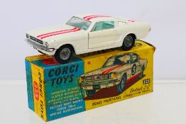 Corgi - A boxed Ford Mustang Fastback # 325.