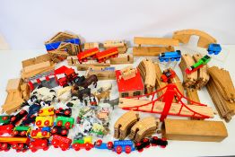Brio - ELC - A collection of Brio wooden train set items including track, station,