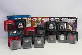 Star Wars - DeAgostini - A group of 1/5 scale Star Wars helmets with their accompanying magazine
