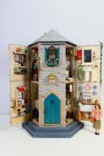 Dolls House - A wooden octagonal dolls house which opens on 2 x sides,