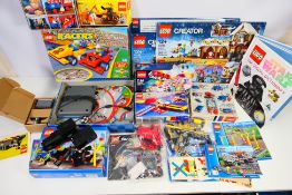 Lego - A group of Lego items including Locomotive # 133, Passenger Coach # 7818, Dragon # 70403,