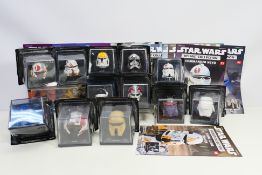 Star Wars - DeAgostini - A group of 1/5 scale Star Wars helmets with their accompanying magazine