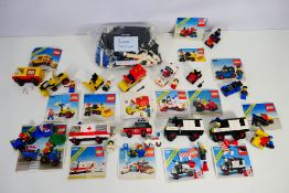 Lego - A group of unboxed vintage Lego kits including Police Van # 6681, Police Station,