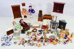 Dolls House - A collection of doll house furniture including fire places, radiators, bathroom suite,
