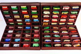 Lledo - A collection of 80 Lledo diecast model buses contained within four wall mounted flock