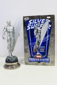 Marvel - Bowen Designs - a rare boxed Silver Surfer painted statue with closed fist approx 45cm