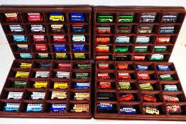 Lledo - A collection of 80 Lledo diecast model buses contained within four wall mounted flock