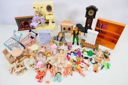 Dolls House - A collection of dolls house furniture including a bathroom suite, grandfather cock,