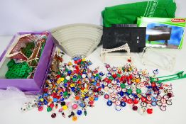 Subbuteo - A very large quantity of loose Subbuteo players and accessories.