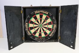 Harrows - A Harrows 'Official Competition' dartboard in wooden case.
