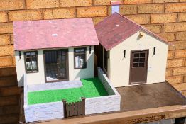 Dolls House - A wooden 3 part chalet style dolls house with garden,