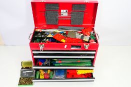 Meccano - A four drawer Halfords tool chest containing a very large quantity of Meccano parts,