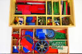 Meccano - A scratch built wooden box containing a large quantity of Meccano parts in various