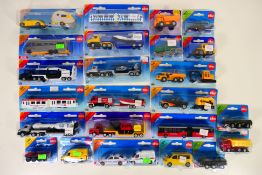 Siku - A carded collection of 24 Siku diecast model vehicles.