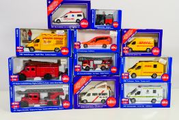 Siku - A boxed collection of 11 Siku diecast model vehicles in various scales.