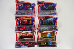 Disney - Pixar - A carded group of six Disney 'Cars' Supercharged sets.