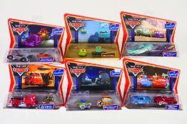 Disney - Pixar - A carded group of six Disney 'Cars' Supercharged sets.