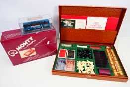 Games Compendium - Monty - Corgi - A boxed games compendium,