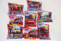 Disney - Pixar - Eight carded Disney 'Cars' vehicles and sets from various series.