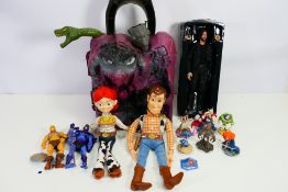 MOTU - Matrix - Toy Story - A group of items and figures including He Man,
