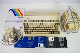Commodore - A vintage Commodore Amiga A600 with power lead, mouse,