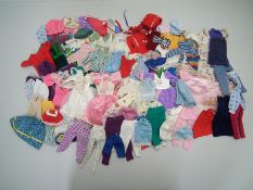 Sindy - Faerie Glen - A collection of Sindy clothing, most items have no label, a dress,