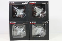 Hogan Wings - 4 x boxed military aircraft models in 1/200 scale including Boeing F/A-18E VFA-14